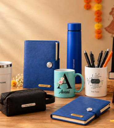 Personalized Navratri corporate gifts for employees and clients with diary, bottle, mug, pen holder and desk accessories.