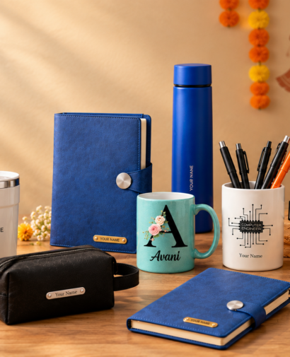Personalized Navratri corporate gifts for employees and clients with diary, bottle, mug, pen holder and desk accessories.