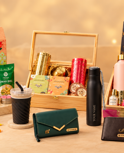 Diwali gift hampers with personalized tumblers, engraved water bottles, custom wallets, festive snacks, sweets, candles, and decorative gift boxes for thoughtful Diwali gifting in 2026.